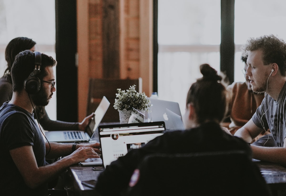 A small sales team reviewing leads